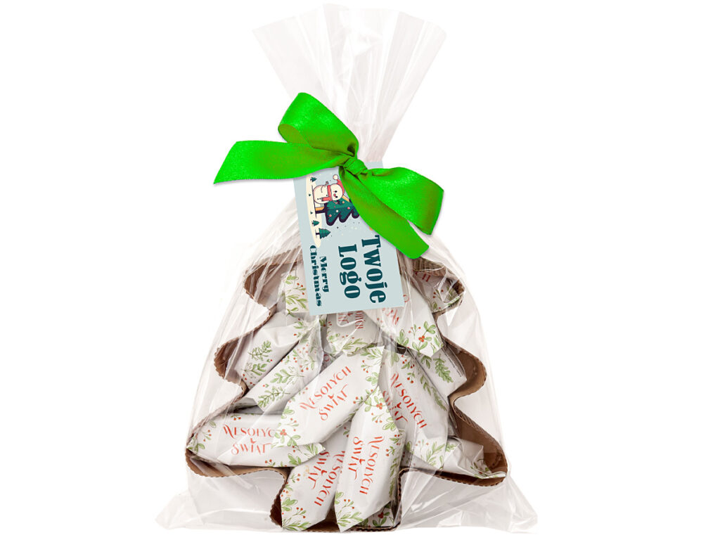 Piernikowe krówki w kształcie choinki z nadrukiem reklamowym na karnecie